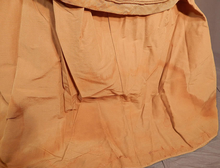 Victorian Khaki Brown Silk Wool Grosgrain Bustle Gown Hoop Skirt Dress
The overskirt measures 34 inches long, with a 22 inch waist. It is in fair as-is condition, not cleaned, with several water stains scattered throughout and fabric discoloration in areas and some slight fraying under the arms and on the bottom back skirt train hem (see close-ups). This is truly a wonderful piece of antique Victoriana textile art which would be great for design, display or restoration!