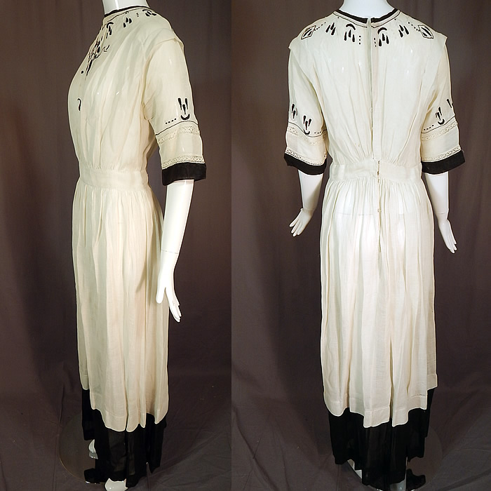 Edwardian Black White Muslin Cotton Arts & Crafts Embroidered Lace Dress
This stunning summer dress is a long floor length with a wide black muslin trim hemline, short sleeves. a fitted waistband, mother of pearl button closures hidden down the back and is sheer, unlined.