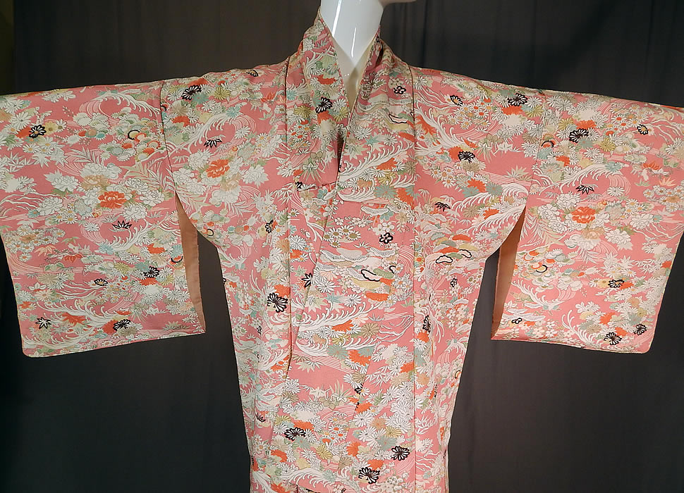 Vintage Japanese Geisha Pink Silk Screen Floral Water Waves Kimono
The kimono measures 57 inches long, with a 40 inch chest, 40 inch waist and 19 inch long sleeves. 