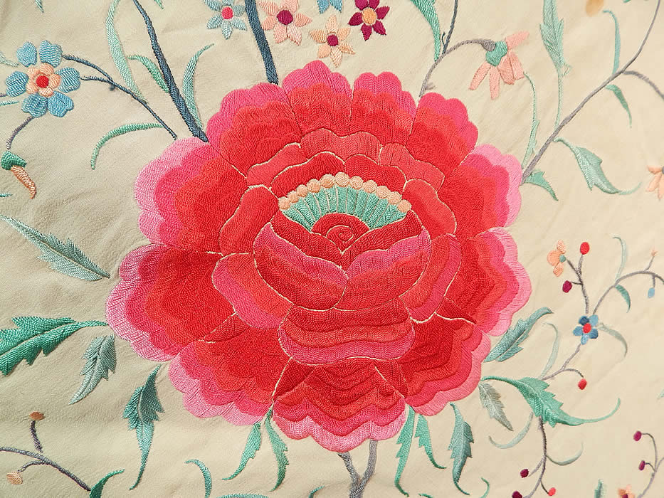 Antique Cream Silk Pastel Embroidered Pink Floral Roses Canton Piano Shawl
There are a variety of pastel flowers embroidered throughout with a vine leaf design, four larger varying shades of pink roses with green stamens in each corner and four more smaller ones in the center. 