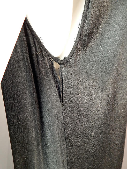 Vintage Black Silk Crepe de Chine Knotted Fringe Flapper Tabard Tunic Dress
It is in fair as-is condition, with a frayed split under one arm and back shoulder (see close-ups). This is truly a wonderful piece of wearable textile art which could be restored or used for display and design inspiration! 