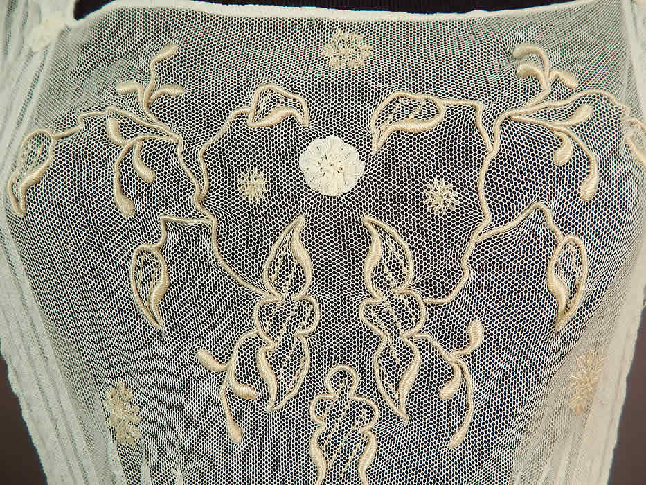 Vintage White Tulle Net Pintuck Pleat Embroidered Lace Applique Maxi Dress
It is made of a white sheer tulle net lace fabric with pintuck pleats, raised padded satin stitch embroidery work, stitched snowflakes and tiny lace rosette appliques.