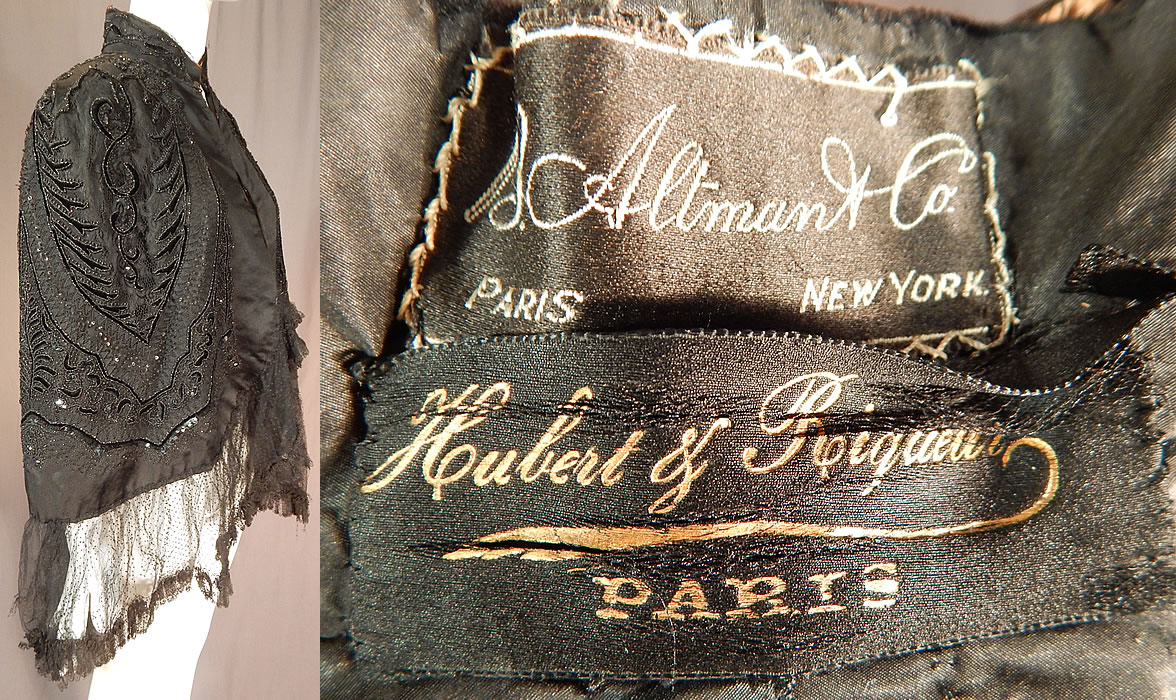 Victorian Hubert & Riqueur Paris Label Black Silk Lace Jet Beaded Mantle Cloak Cape
It is made of a black silk fabric, covered with a black lace overlay, black velvet appliques, sequins creating a butterfly wing design on the back and a sheer Swiss dot net tulle trim ruffle edging along the bottom. 