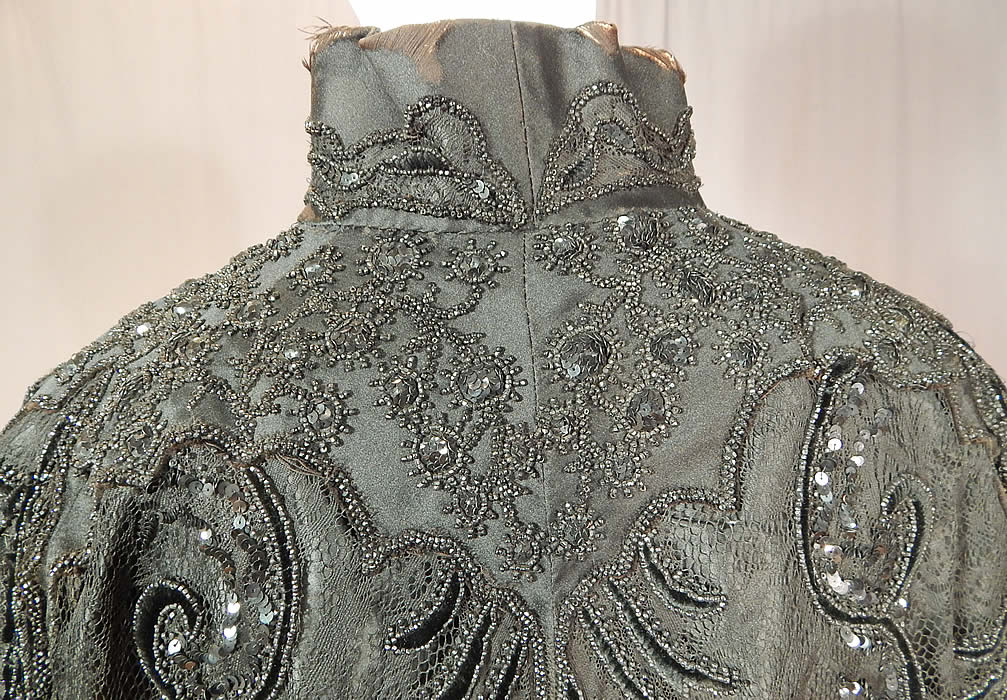Victorian Hubert & Riqueur Paris Label Black Silk Lace Jet Beaded Mantle Cloak Cape
The cape measures 36 inches long, 26 inches wide across the back shoulders, with a 14 inch neck. 