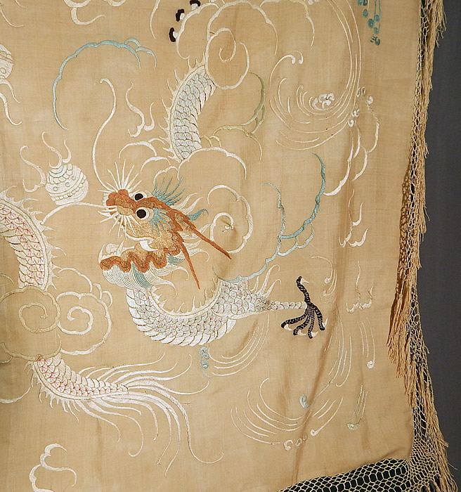 Antique Chinese Dragon Pongee Raw Silk Embroidery Fringe Shawl Tablecloth Tapestry
This square shawl style tablecloth tapestry has a fine hand knotted macram&eacute; silk fringe trim measuring 6 inches long surrounding the entire shawl and is fully lined, backed in a silk fabric.