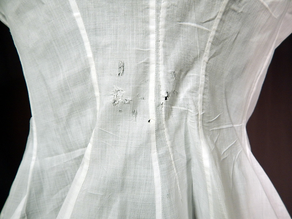 Victorian Lingerie White Cotton Batiste Lace Trim Camisole Corset Cover Top
It is in good as-is condition, with a small frayed hole under one arm and several tiny pin holes, frays clustered on the back waist (see close-ups). This is truly a wonderful piece of Victoriana antique lace lingerie wearable art! 