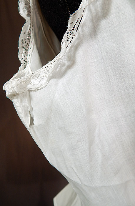 Victorian Lingerie White Cotton Batiste Lace Trim Camisole Corset Cover Top
It is in good as-is condition, with a small frayed hole under one arm and several tiny pin holes, frays clustered on the back waist (see close-ups). This is truly a wonderful piece of Victoriana antique lace lingerie wearable art! 