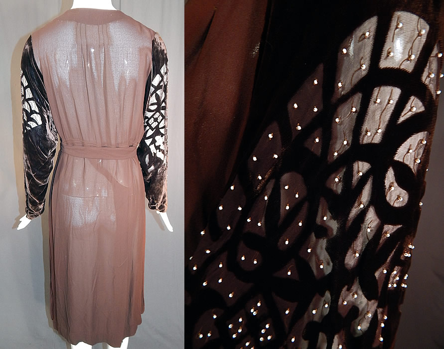 Vintage Brown Silk Crepe Devore Voided Velvet Beaded Sleeve Bias Cut Dress
. The dress measures 44 inches long, with a 38 inch bust, 34 inch waist and 44 inch hips. It is in good condition, with only some slight fade discoloration on the skirt. This is truly a wonderful piece of wearable textile art!