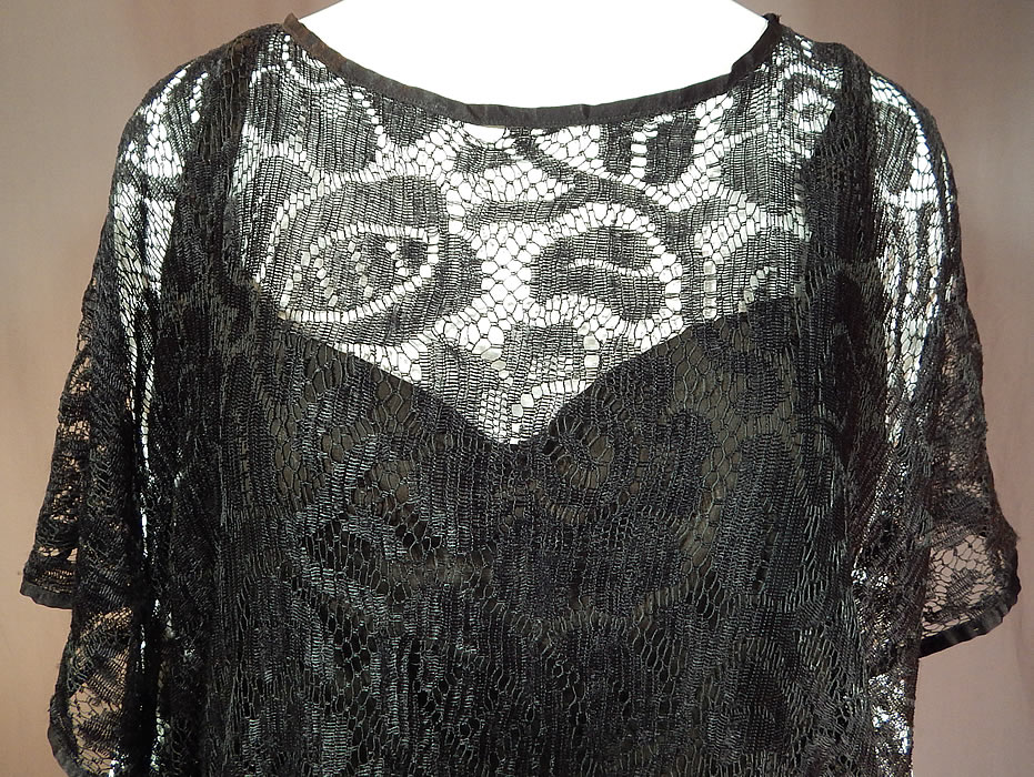 Vintage Art Deco Black Silk Sheer Lace Batwing Blouse Flapper Fringe Tassel Top
The blouse measures 28 inches long, with a 44 inch bust and 40 inch waist. It is in good condition, with only a small frayed hole in the lace on the front neckline (see close-up).