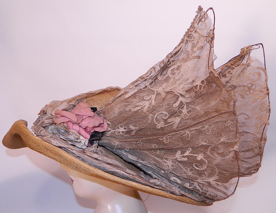Edwardian Woven Natural Straw Tambour Net Lace Wired Wing Floral Wide Brim Hat. It is made of a woven natural straw basket weave, with a wired wing trim covered with an off white cotton net tambour embroidery lace.
