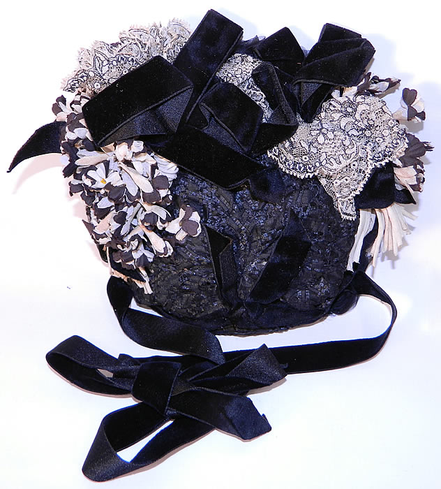Victorian Black & White Violet Flower Lace Trim Straw Bonnet Hat. This beautiful bonnet has black velvet ribbon ties for securing under the chin. 