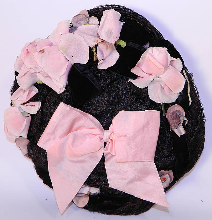 Victorian Black Straw Pink Pansy Rose Flower Bow Trim Bonnet Flat Plate Hat. The bonnet measures 31 inches in circumference and 10 inches across. It is in good condition.