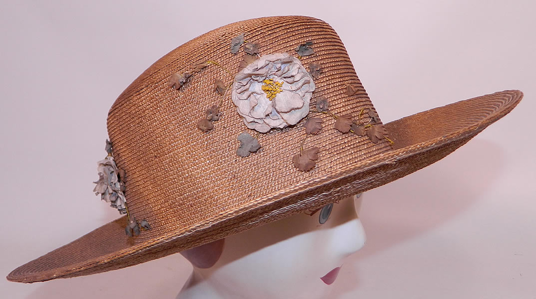 Edwardian Belle Epoque Natural Straw White Floral Wide Brim Boater Summer Hat. This beautiful Belle Epoque summer straw boater style hat has a wide brim, tall round crown which is lined in a white cotton fabric inside. 