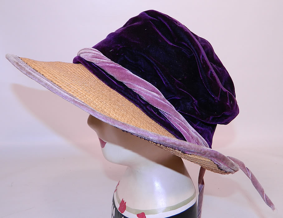 Vintage Natural Straw Wide Brim Purple Velvet Crown Cloche Hat. It is made of a tightly woven natural straw wide brim, with a lavender velvet trim brim edging, hatband bow back trim and dark purple velvet slouched crown top.
