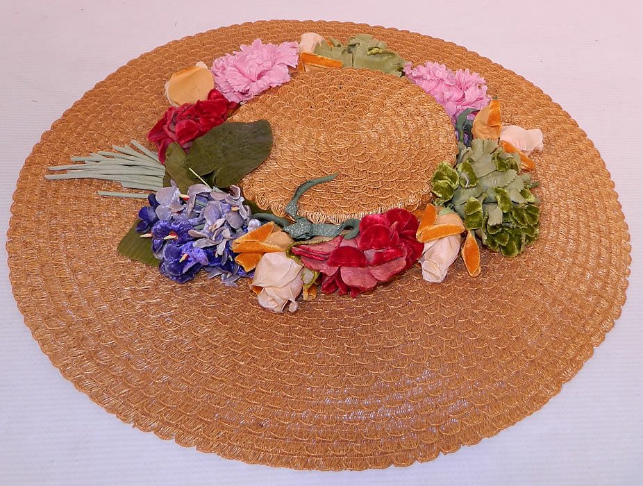 Vintage Woven Natural Straw Silk Velvet Flowers Wide Brim Summer Cartwheel Hat. This vintage woven natural straw silk velvet flowers wide brim summer sun cartwheel hat dates from the 1940s.
