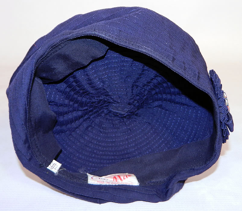 Vintage Eva Mae Navy Blue Pleated Beret Tam Hat & Italian Micro Mosaic Brooch Pin. There is a "Eva Mae Hat of Distinction" designer label and size 22 tag sewn inside. 