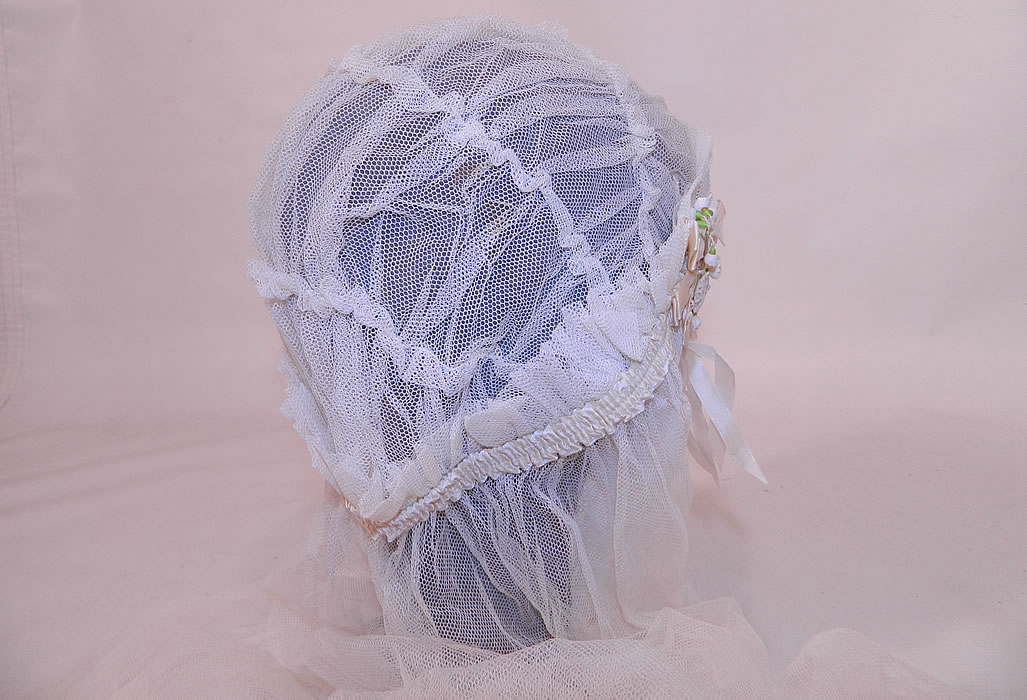 Vintage White Net Lace Silk Ribbon Bridal Bonnet Cap Headpiece Wedding Veil. This beautiful bridal flapper wedding headpiece has a fitted bonnet cap style with ruched tucks gathers along the top and a long net veil hanging down the back. 