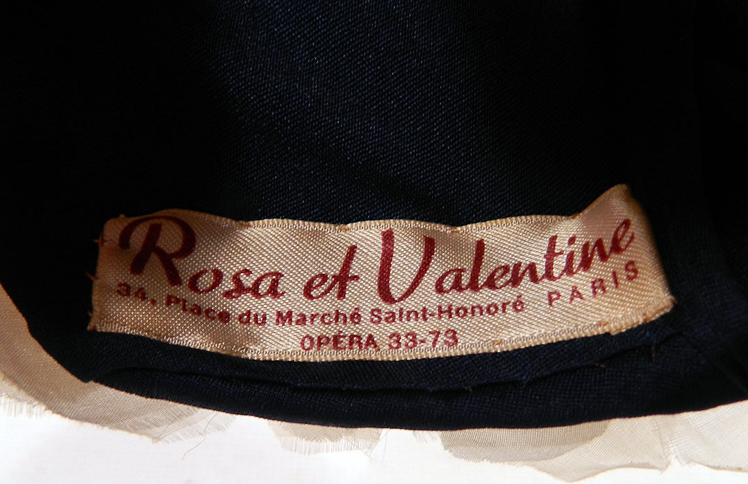 Vintage Rosa et Valentine Paris Label Blue Silk White Magnolia Flower Fascinator Hat.There is a "Rosa et Valentine 34, Place du Marche Saint-Honore Paris Opera 33-73" designer label sewn inside. 