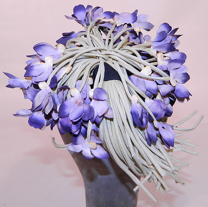 Vintage Black Silk Grosgrain Ribbon Purple Violet Flower Fascinator Hat
The hat measures 22 inches in circumference. 