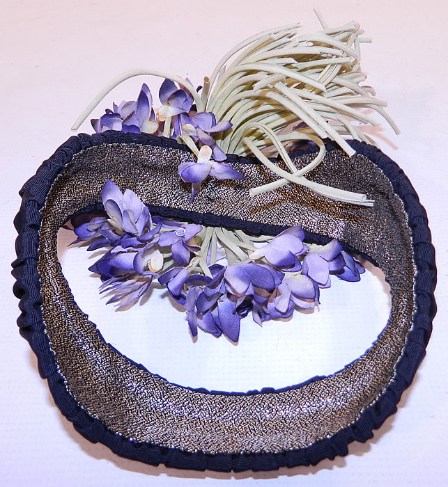 Vintage Black Silk Grosgrain Ribbon Purple Violet Flower Fascinator Hat
It is in good condition. This is truly a wonderful piece of quality made wearable millinery art! 