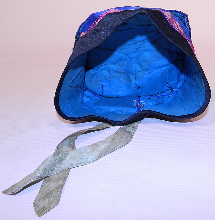 Antique Chinese Child Infant Silk Embroidered Butterfly Wind Hat Cap
This child's wind hat has a round pill box cap shape, lined in blue fabric. The hat measures 17 inches in circumference inside. It is in good condition, with only some missing black soutache embroidery stitching in areas. This is truly a beautiful piece of one of a kind antique Chinese textile art and would make for a wonderful display piece! 
