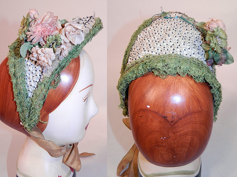 Victorian Civil War Beaded Woven White Straw Green Lace Pink Flower Trim Spoon Bonnet
This beautiful bonnet has a small crescent shape, with long curving sides which come to a point at the bottom, a high tall brim and brown silk ribbon ties for securing under the chin. The bonnet measures 17 inches in circumference around the front opening and is 6 inches deep.