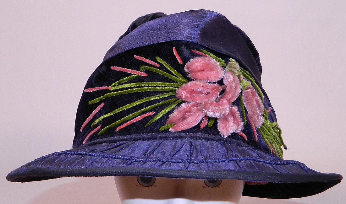 Vintage Periwinkle Silk Velvet Wide Brim Chenille Embroidered Flower Flapper Cloche Hat
This vintage periwinkle silk velvet wide brim chenille embroidered flower flapper cloche hat dates from the 1920s.