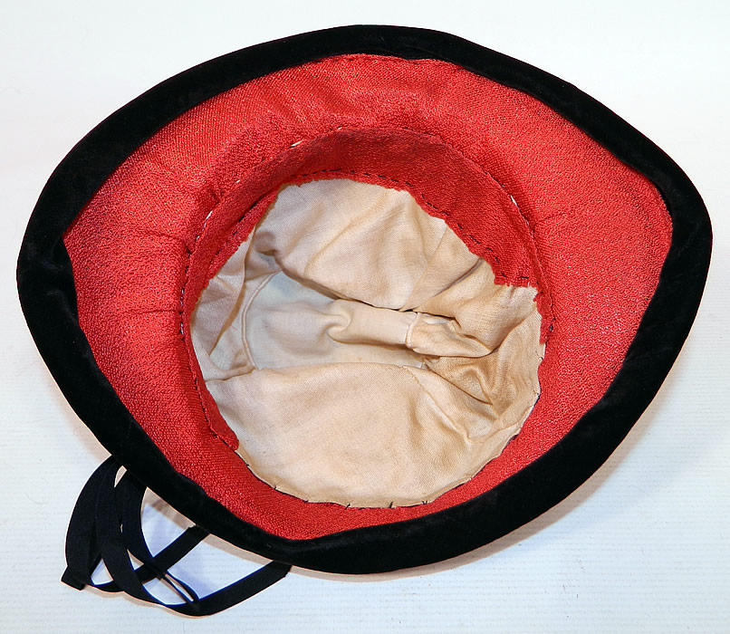 Vintage Black Velvet Red Soutache Embroidered Flower Flapper Cloche Hat
The hat measures 22 inches inside crown circumference. It is in excellent condition. This is truly a wonderful piece of wearable Art Deco millinery art! 