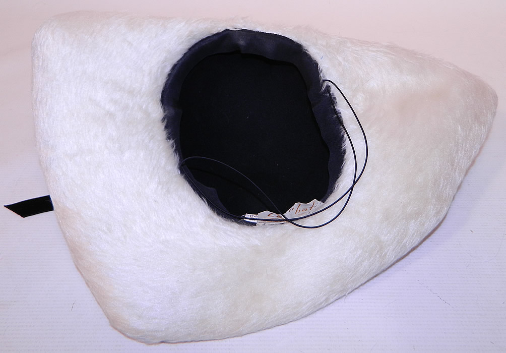 Vintage Leon Hats NY Label Black & White Felt Fur Jet Beaded Trim Tricorn Hat
The hat measures 22 1/2 inches in circumference inside the crown and 47 inches outside.
It is in excellent condition. This is truly a wonderful piece of wearable millinery art! 
