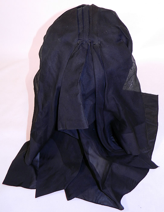 Victorian C.F. Hovey & Co Boston Label Black Silk Crepe Veil Full Mourning Bonnet Hat
There is pleating on the top with the original hat pins to secure it.