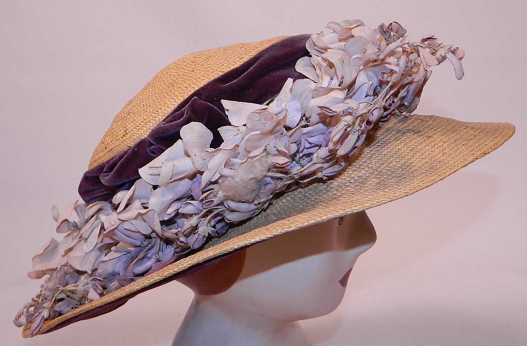 Edwardian Woven Natural Straw Purple Velvet Violet Flower Trim Wide Brim Hat
This is truly a wonderful piece of wearable millinery art! 