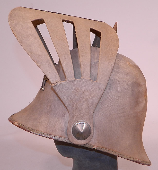 Vintage Odd Fellows Fraternal Skull Cross Bones Knights Louvered Visor Helmet Hat
It is in good as-is condition, with some wear, soiling, water spot stains and slight fraying along the trim edging. This is truly a rare and unusual piece of wearable millinery art! 