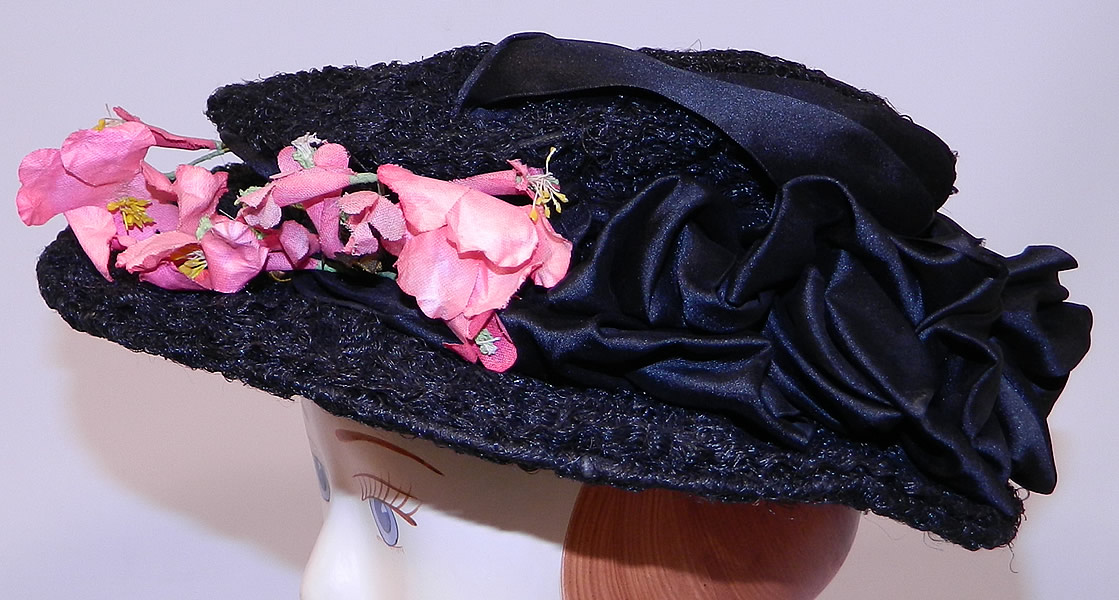 Victorian Black Woven Horse Hair Straw Pink Floral Wide Brim Hat Hatpin
It is made of a black woven horse hair style straw fabric, with black silk ribbon and pink silk flower trim.