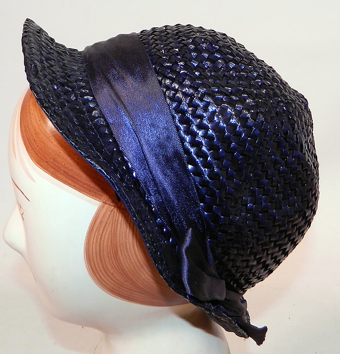 Vintage Navy Blue Woven Straw Red Cherry Silk Ribbon Bow Trim Childs Cloche Hat
The hat measures 19 1/2 inches inside circumference. 