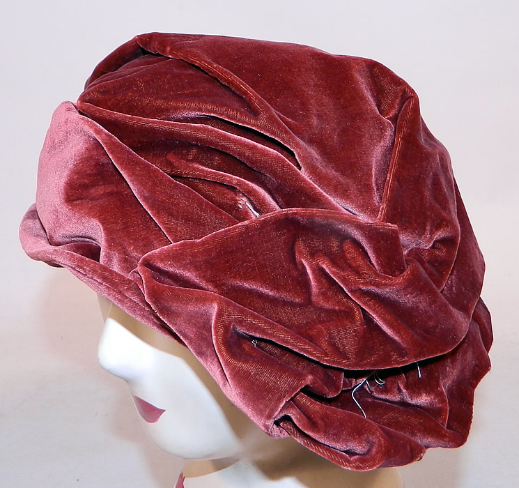 Vintage Art Deco Burgundy Red Silk Velvet Wrapped Turban Toque  Cloche Hat
This beautiful brimless toque style turban hat has a wrapped draped design with tucks and gathering. 