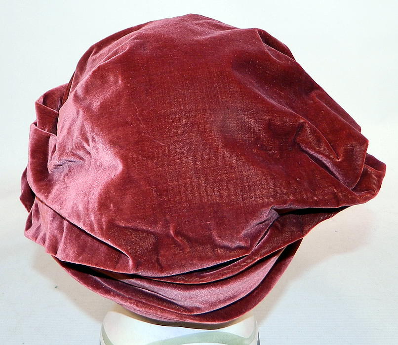 Vintage Art Deco Burgundy Red Silk Velvet Wrapped Turban Toque  Cloche Hat
The hat measures 22 1/2 inches inside crown circumference. It is in good condition. This is truly a wonderful piece of quality made wearable millinery art!