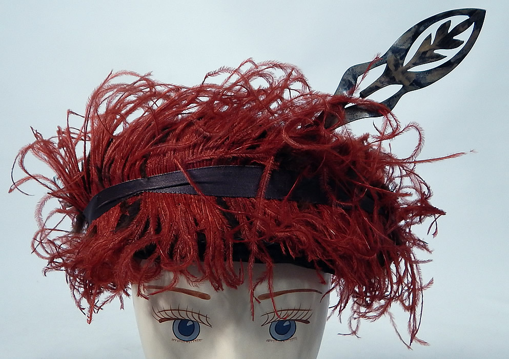 Vintage McGrath Millinery Belle Epoque Burgundy Velvet Feather Trim Toque Hat
This vintage McGrath Millinery Belle Epoque burgundy velvet feather trim toque hat and pin dates from 1915.