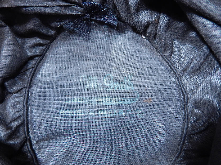 Vintage McGrath Millinery Belle Epoque Burgundy Velvet Feather Trim Toque Hat
This beautiful Belle Epoque brimless toque style hat comes with a decorative cut out metal hat pin and is fully lined in black cotton with a "McGrath Millinery Hoosick Falls, N.Y." label inside. 
