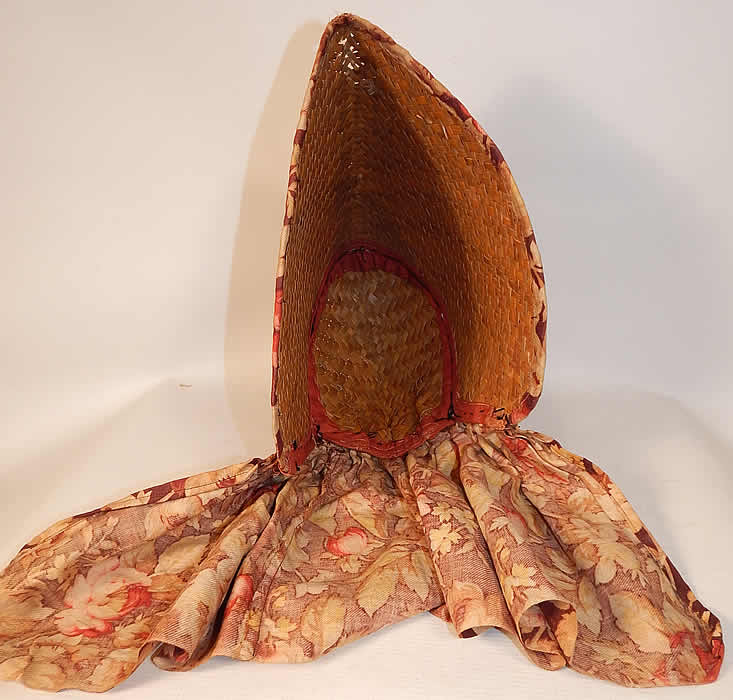 Victorian Womens Woven Natural Straw Chintz Curtain Sunbonnet Sunhat Bonnet
It is unlined and has no front tie closures. The bonnet measures 7 inches long, with an additional 9 inch long fabric flounce back and is 12 inches deep. 