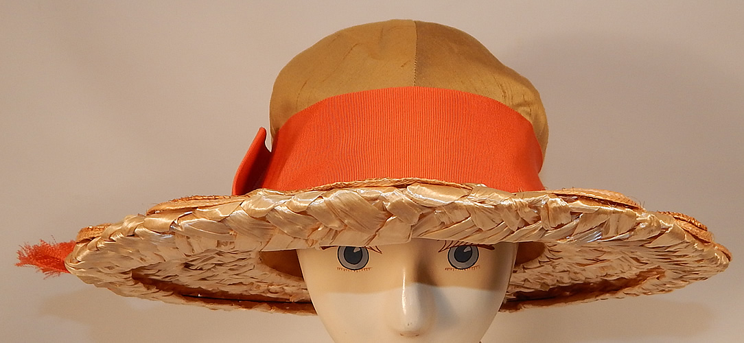 Vintage Schiaparelli Paris Yellow Orange Silk Woven Natural Straw Raffia Wide Brim Hat
It is made of a mustard yellow raw silk fabric crown, with a bright orange silk grosgrain ribbon hatband, bow trim side and woven basket weave natural straw, raffia brim.