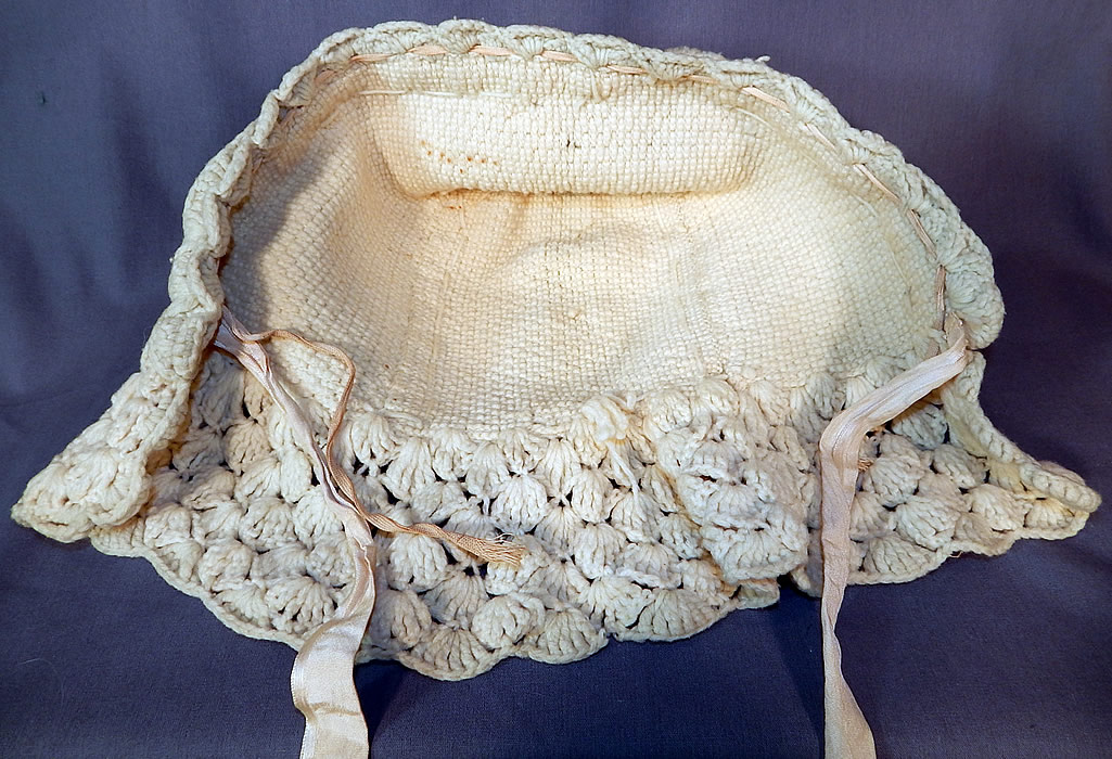 Victorian White Wool Hand Knit Nubby Crochet Winter Sled Carriage Bonnet
he bonnet measures 12 inches long, 8 inches deep and 18 inches around the face. It is in good condition, with only minor wear. This is truly a wonderful piece of wearable Victoriana hand knit art! 