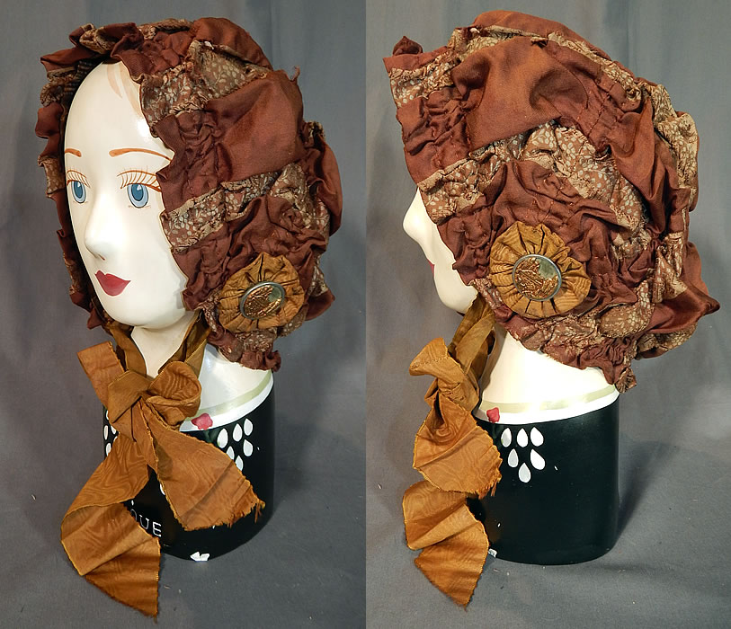 Victorian Brown Silk Ruched Ribbon Steel Cut Button Trim Carriage Bonnet Travel Cap Hat
This antique Victorian era brown silk ruched ribbon steel cut button trim carriage bonnet travel cap hat dates from 1890.