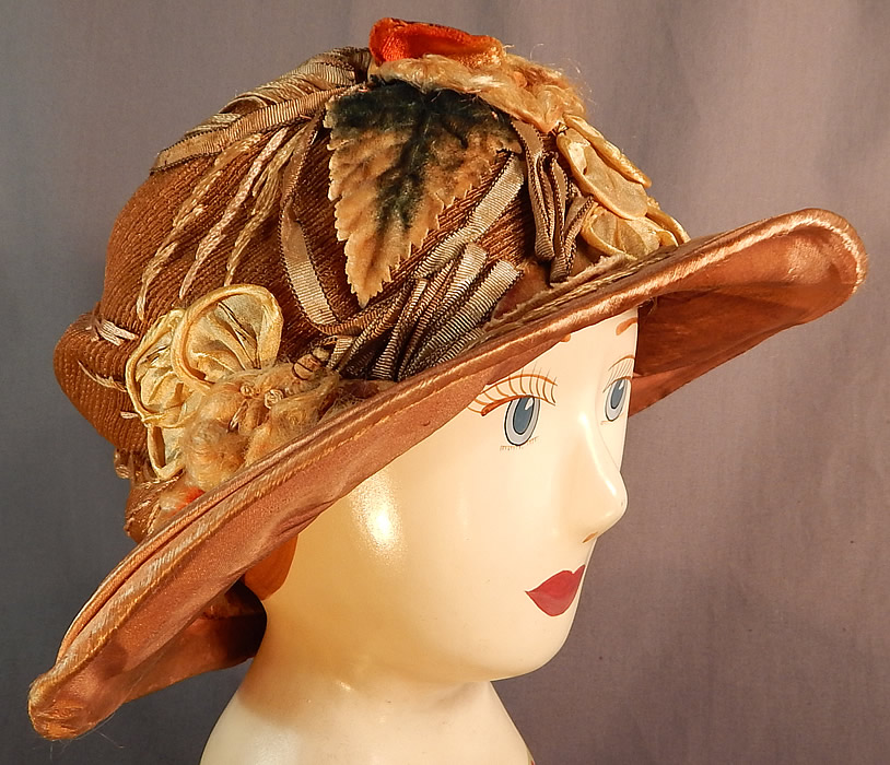 Vintage M. Lurie & Co Harvest Gold Woven Silk Ribbon Rosette Wide Brim Cloche Hat
This vintage M. Lurie & Co harvest gold woven silk ribbon rosette wide brim cloche hat dates from the 1920s.