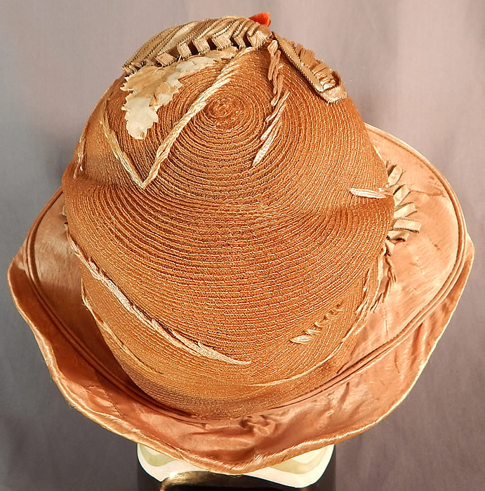 Vintage M. Lurie & Co Harvest Gold Woven Silk Ribbon Rosette Wide Brim Cloche Hat
This is truly a wonderful piece of quality made wearable textile millinery art!