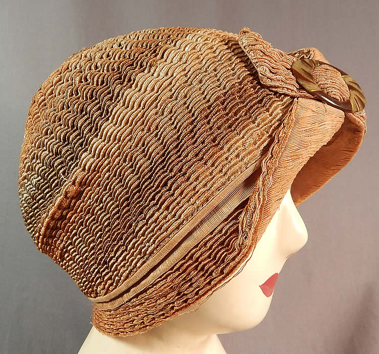 Vintage Art Deco Striped Brown Ombre Woven Straw Flapper Cloche Hat & Buckle
There is a decorative two tone brown celluloid buckle trim on the front. 