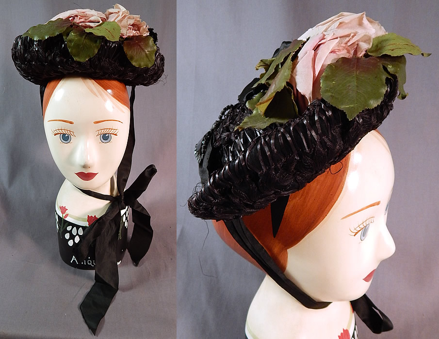 Victorian Woven Black Straw Pink Roses Jet Beaded Buckle Trim Bonnet Hat
This antique Victorian era woven black straw, pink roses, jet beaded buckle trim bonnet hat dates from the 1880s. It is made of a black silk fabric covered with a black woven straw and has a black, pink silk rose flower trim on top.