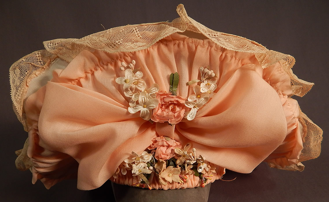 Victorian Style Ruth Stockley Society Silk Embroidery Floral Peach Bonnet Hat
The hat measures 22 inches inside crown circumference, with a 4 inch wide brim. It is in excellent condition. 