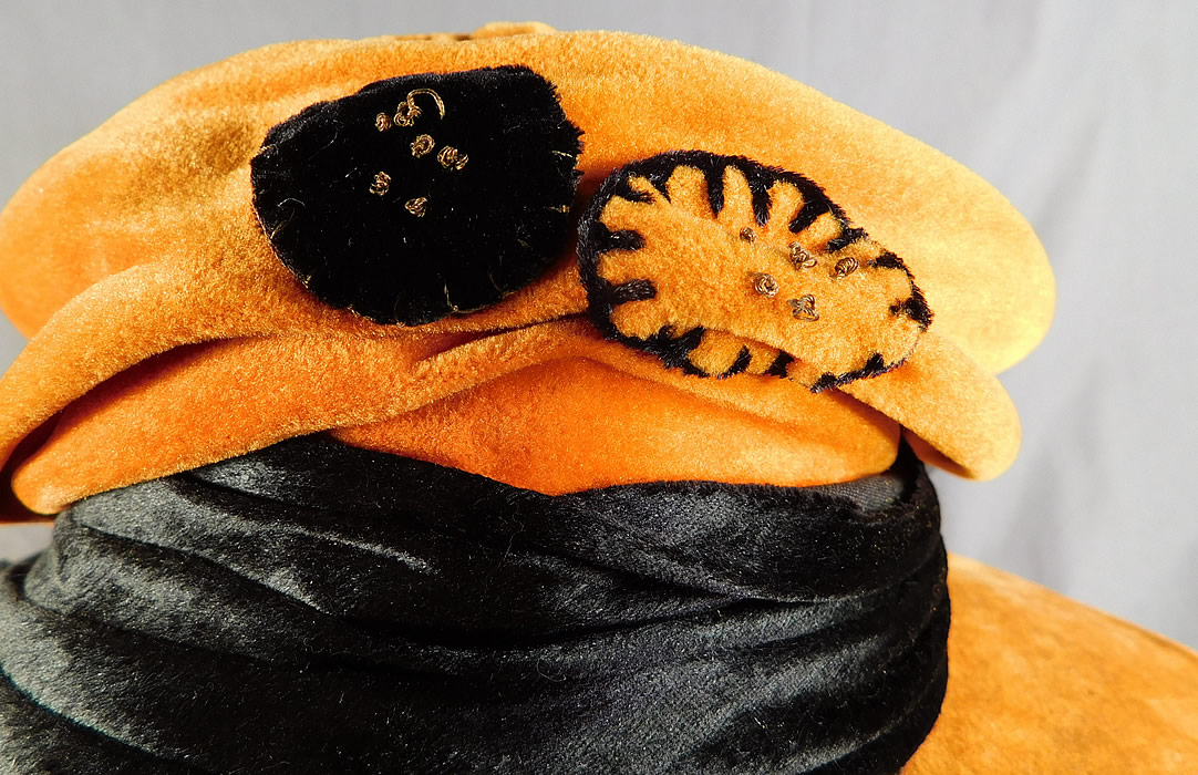 Vintage Harris Hat & Cloak Shop Orange Black Velvet Winged Wide Brim Cloche
This is truly a wonderful piece of quality made wearable textile millinery art! 