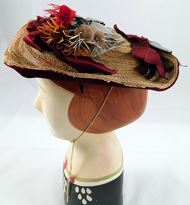 Victorian Womens Natural Straw Pork Pie Wide Brim Bonnet Hat Ribbon Thistle Trim
It is made of woven natural straw, with a decorative basket weave design, burgundy red, blue silk ribbon bows and colorful puff ball flower thistle trimmings on top.