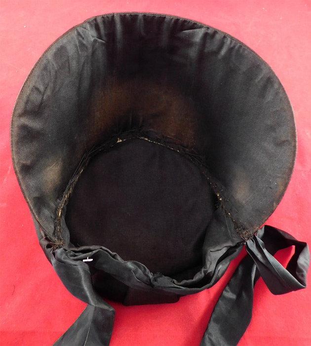 Victorian Style Quaker Amish Black Silk Wide Brim Bonnet Carriage Hat
The hat measures 33 inches in circumference, with a 6 inch wide front brim and is 7 1/2 inches deep inside the crown. It is in good condition with only some slight faint staining on the inside lining under the brim. This is a truly a wonderful Plain people hat! 